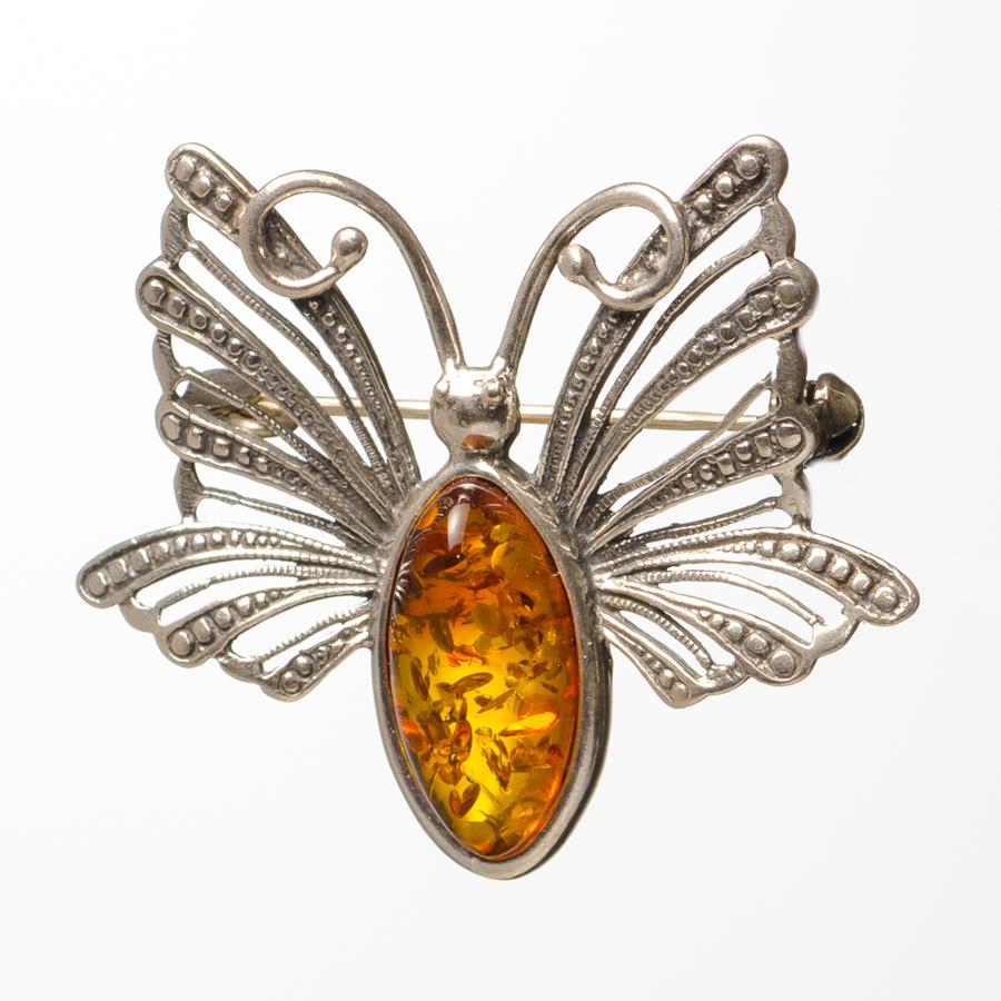 Broche ambre et argent en forme de papillon